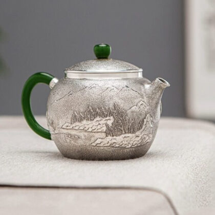 Handcrafted Silver Teapot with Mountain Landscape Design